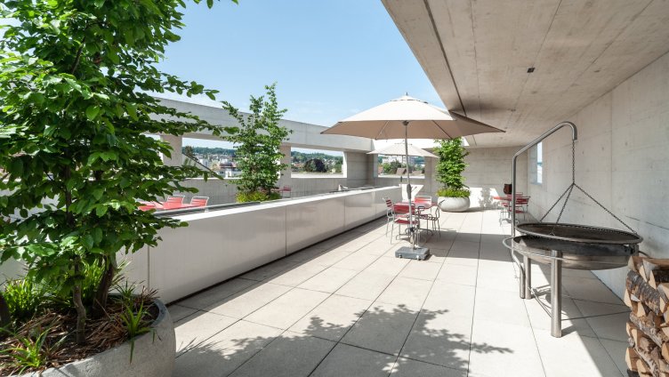 DAS TRÖSCH Lounge und Dachterrasse